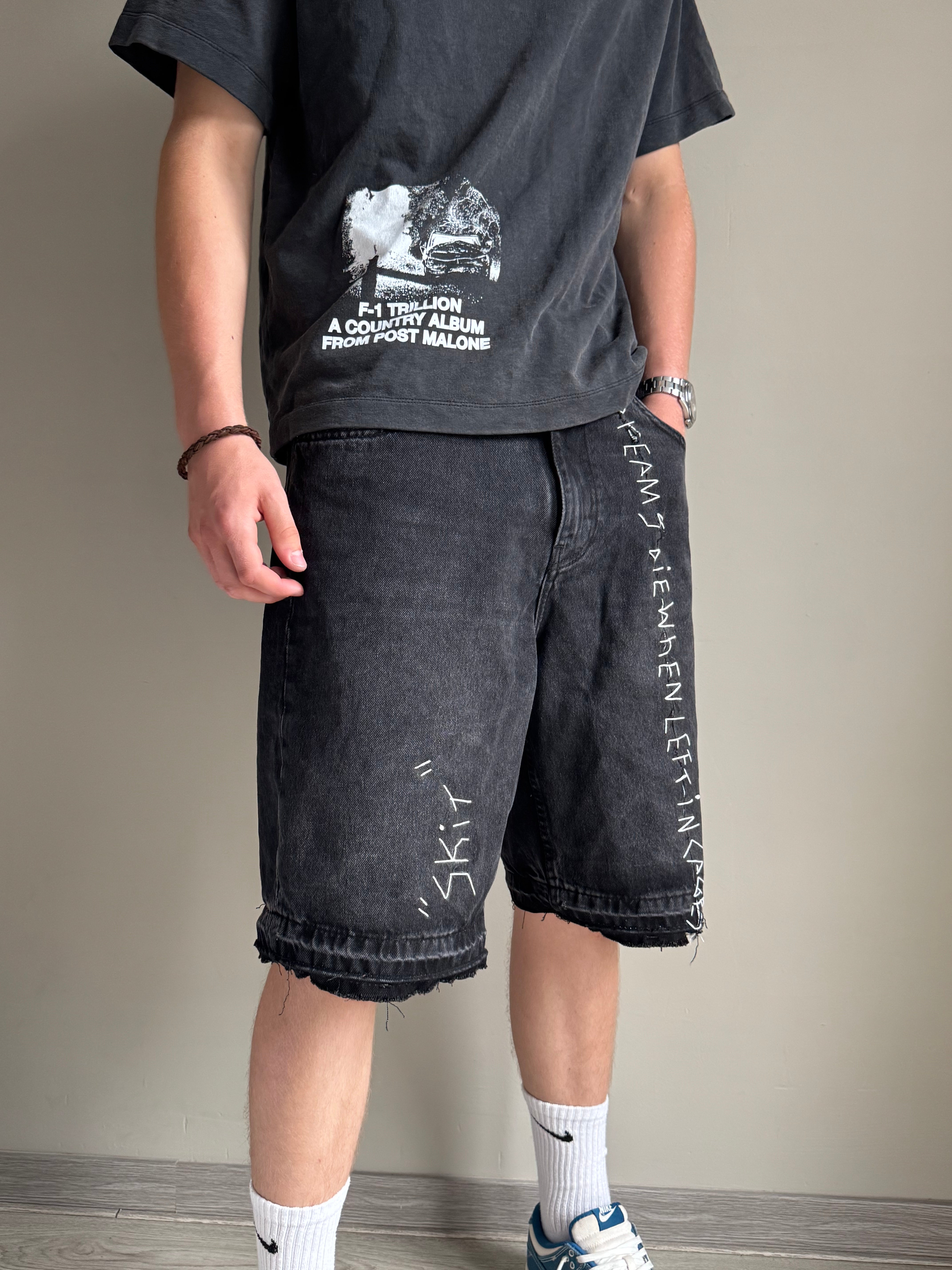 "DREAMS DIE WHEN LEFT IIIN CAGES" jean shorts