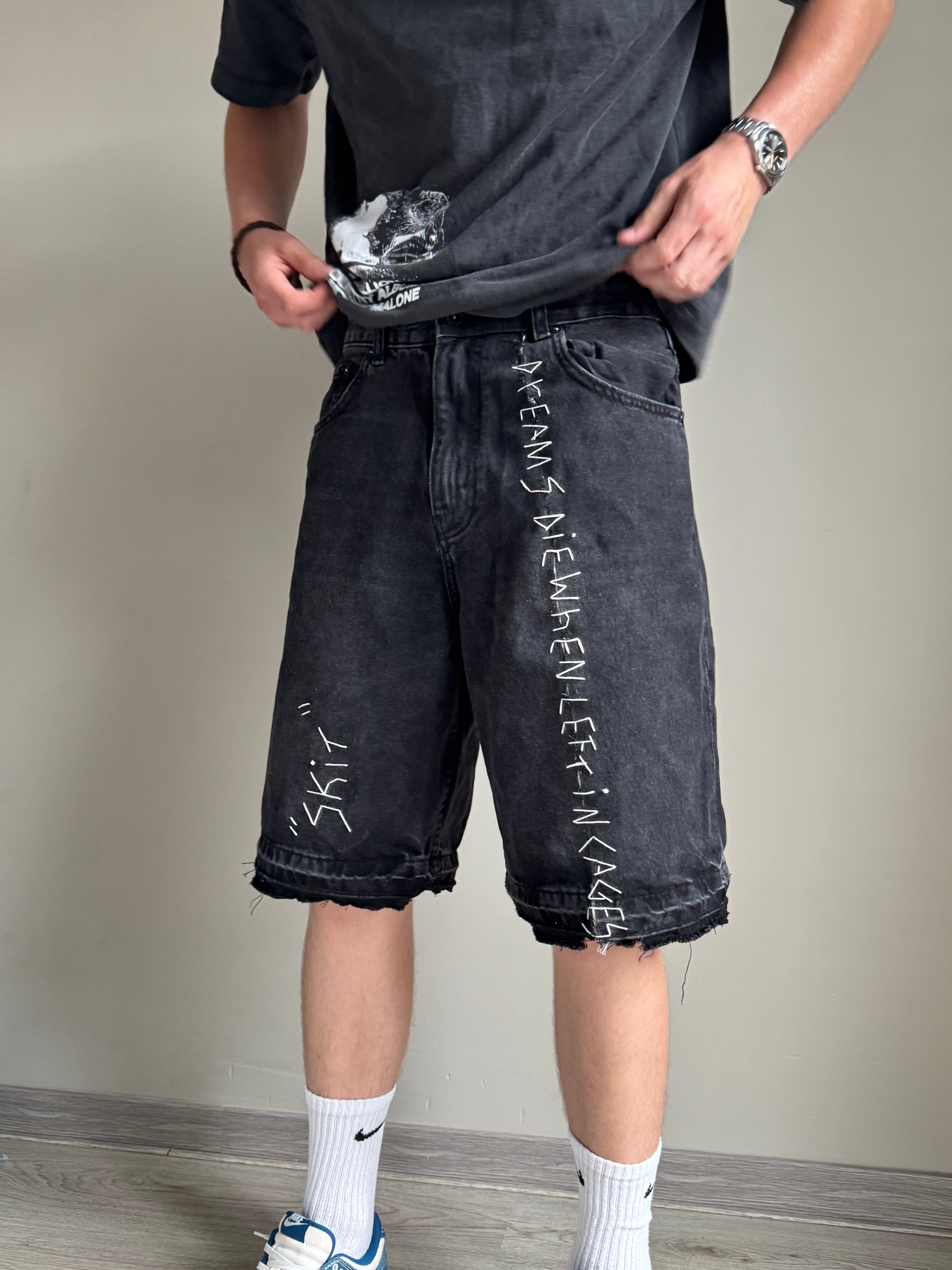 "DREAMS DIE WHEN LEFT IIIN CAGES" jean shorts