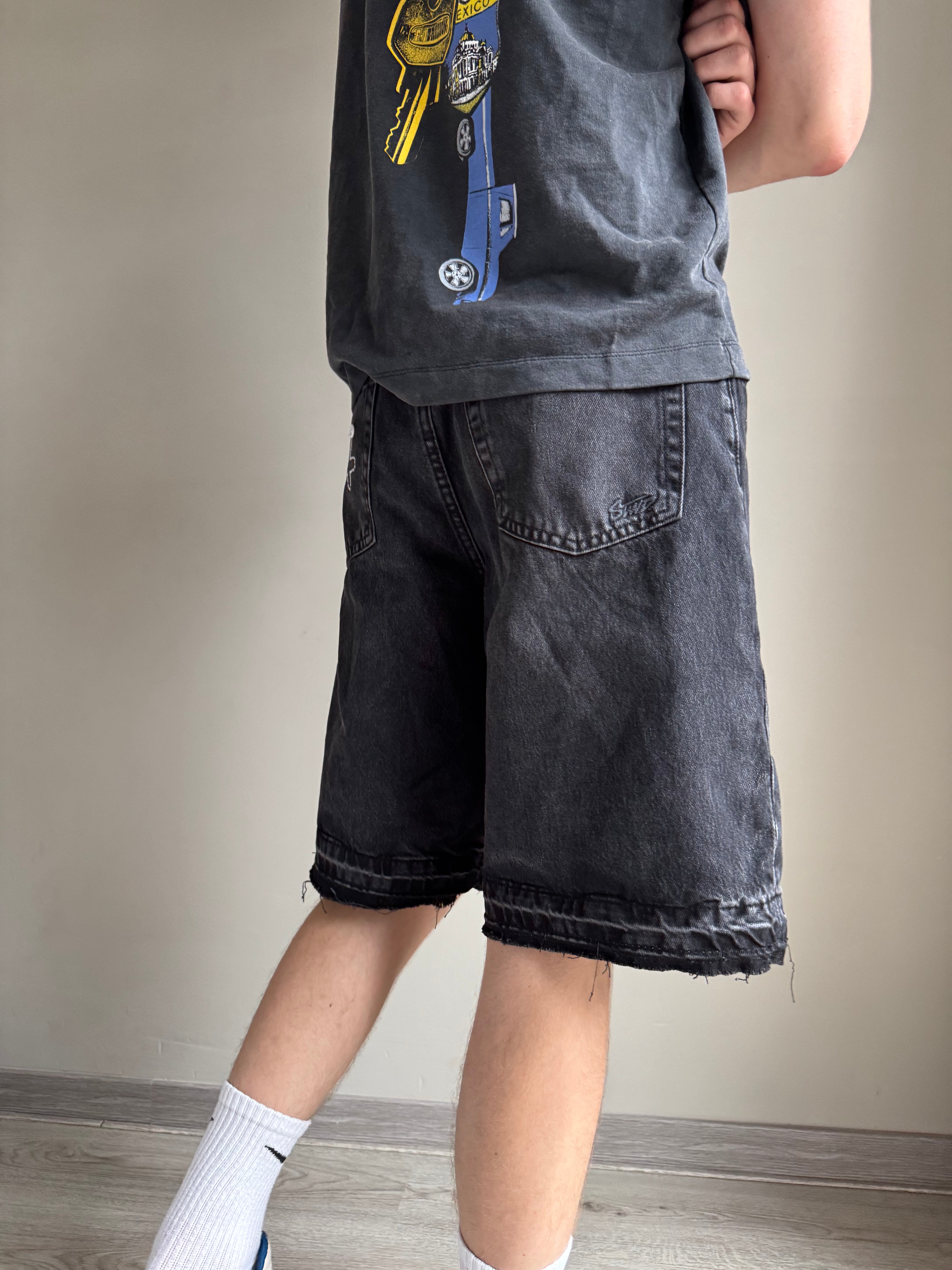 "DREAMS DIE WHEN LEFT IIIN CAGES" jean shorts