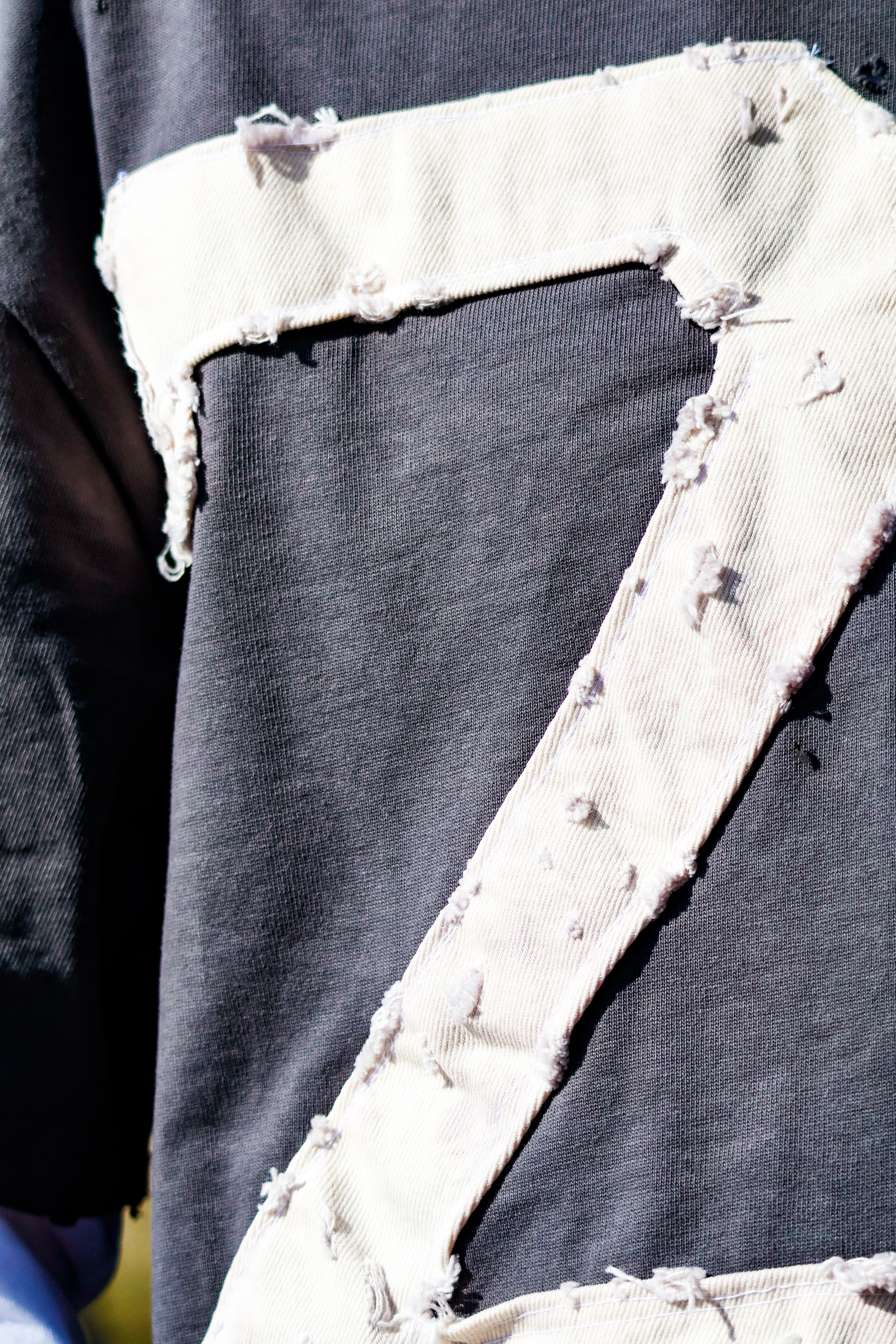 "BRUIIISED" shirt