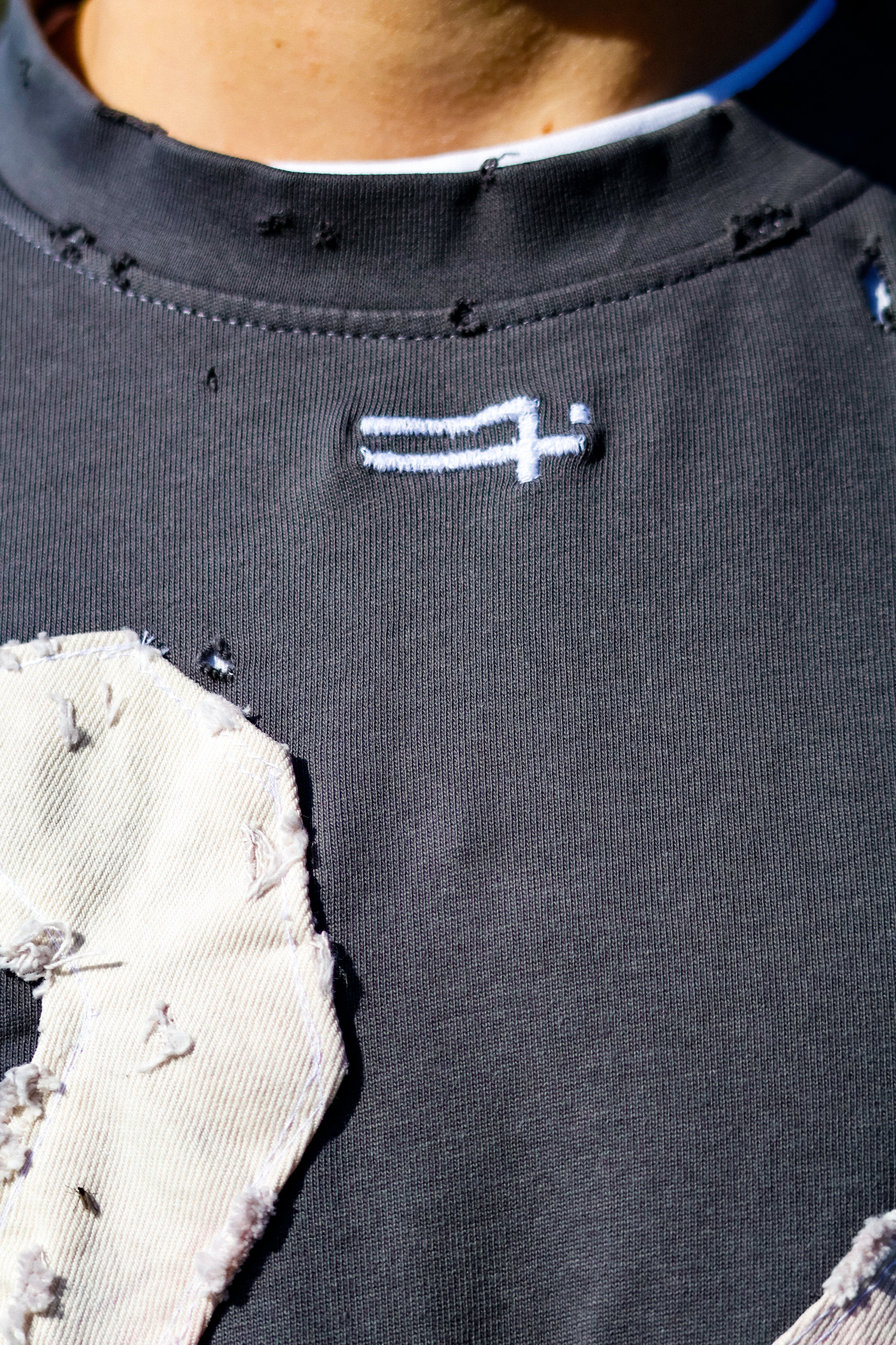 "BRUIIISED" shirt