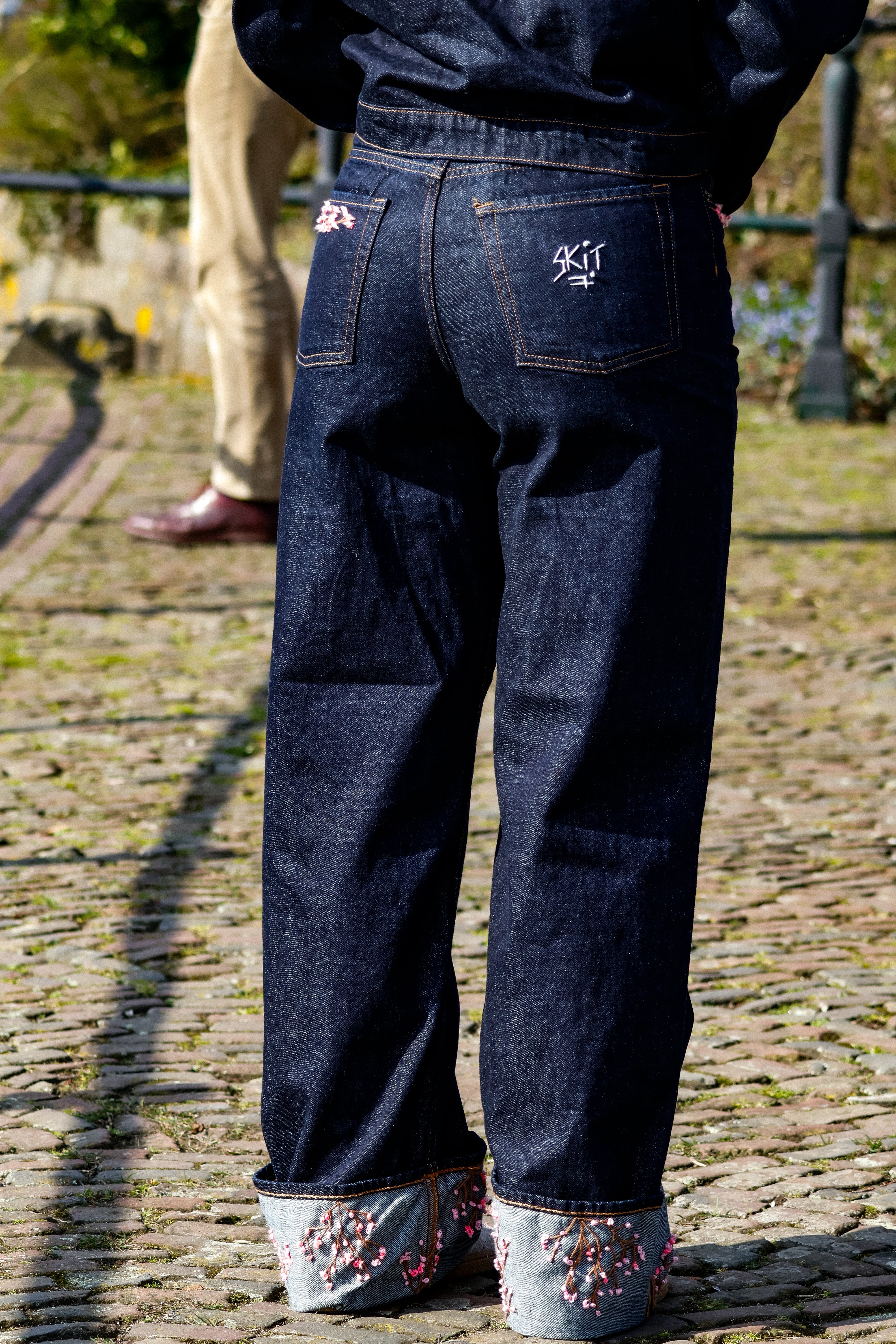 "RESIIISTANCE" denim suit