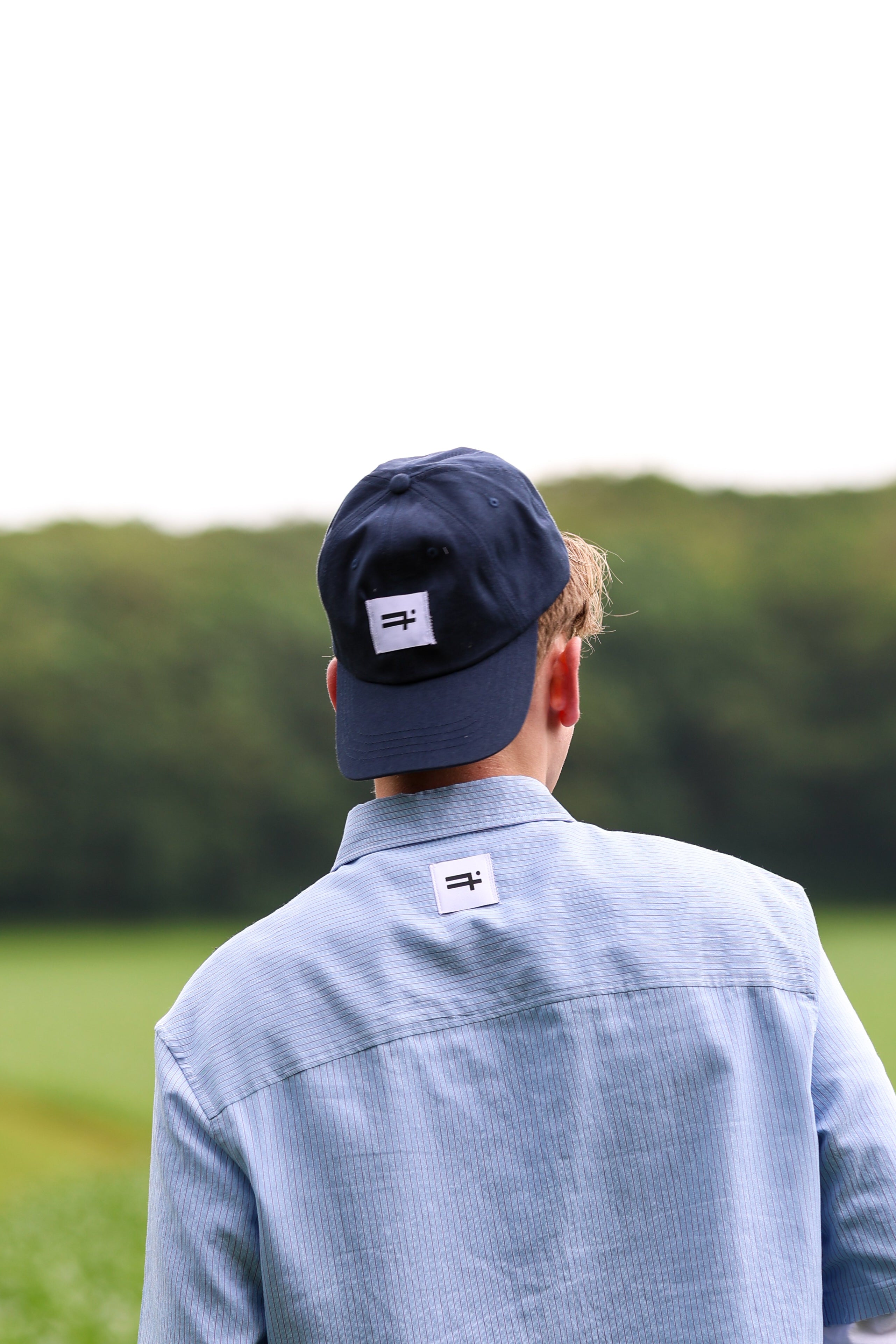 "PLAIIIN" cap