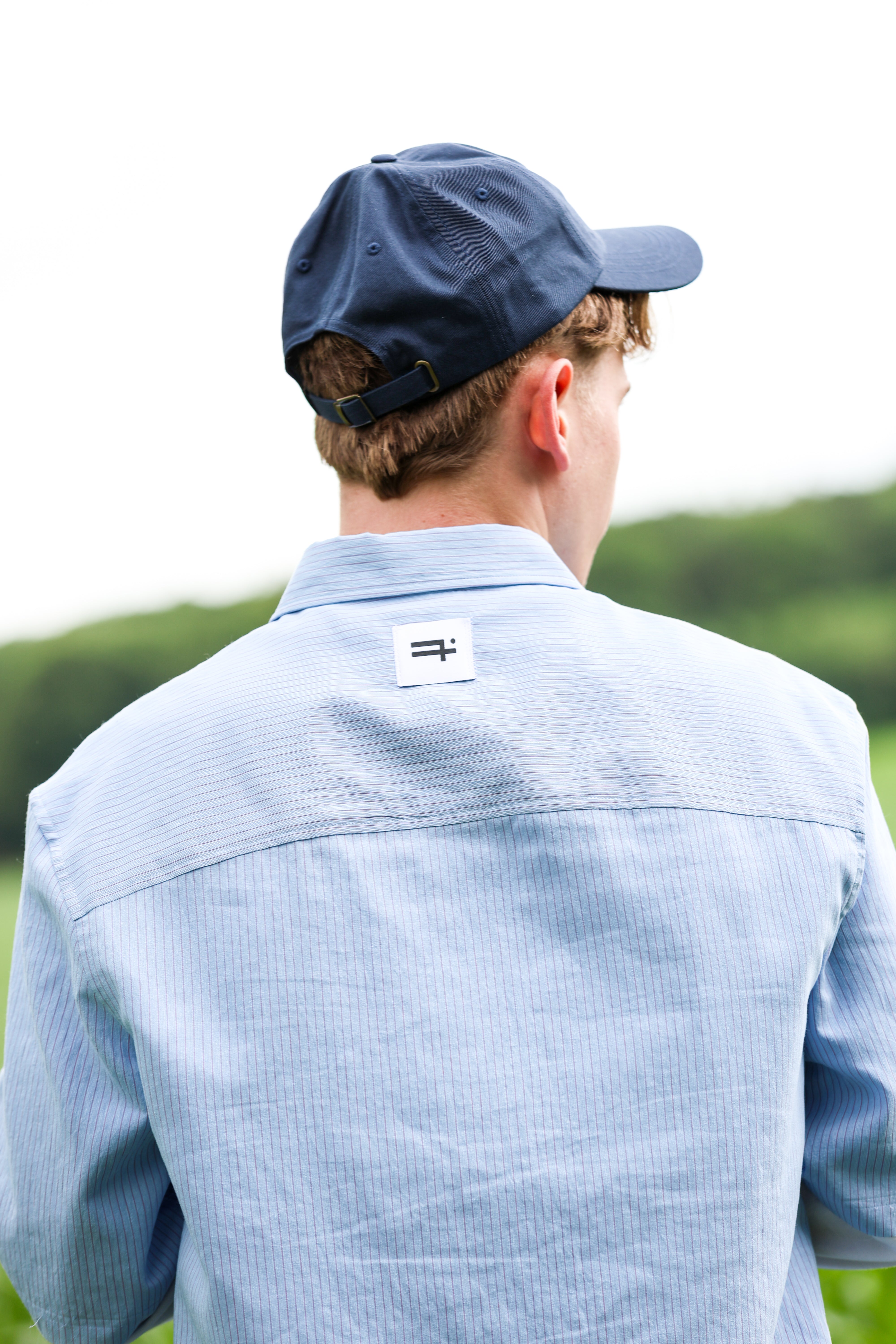 "PLAIIIN" cap