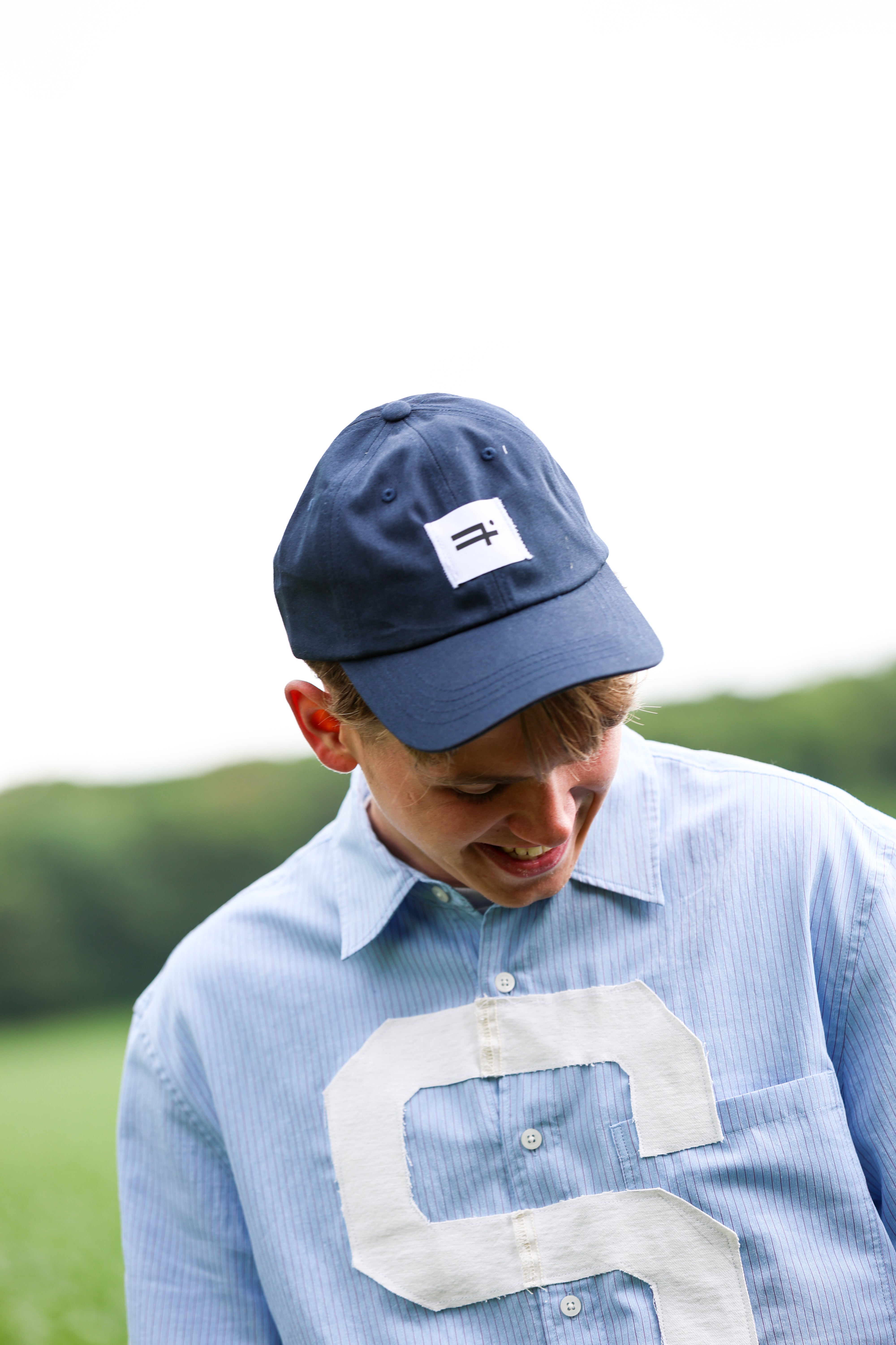 "PLAIIIN" cap