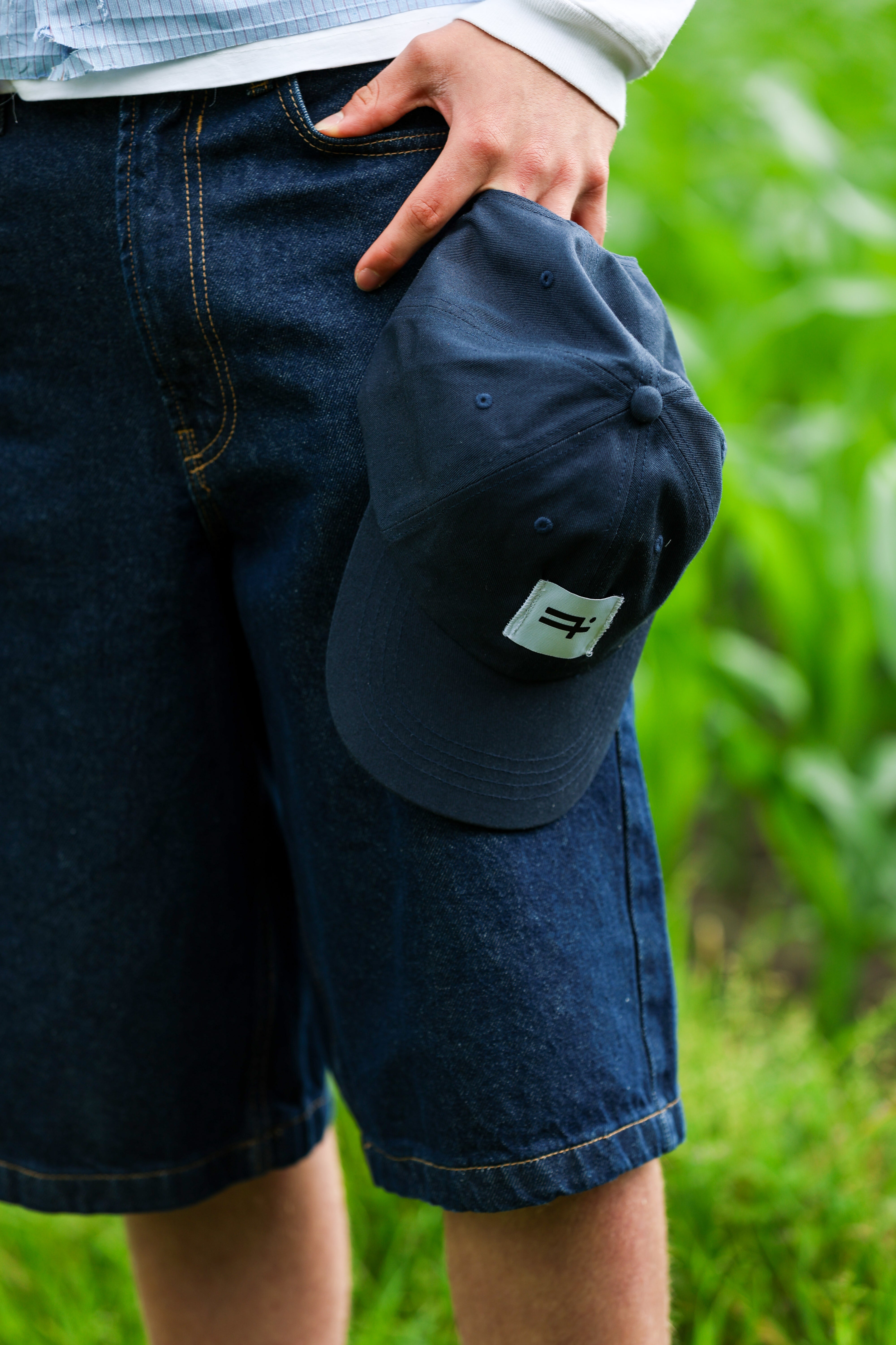 "PLAIIIN" cap